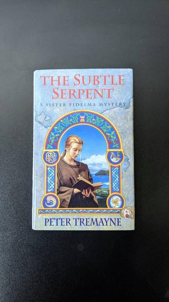 The Subtle Serpent by Peter Tremayne, Signed First Edition.