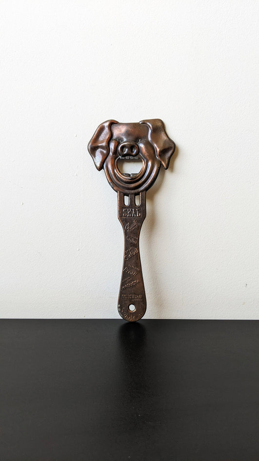 Vintage Jolly Pig Bottle Opener, Multi Lingual Cheers Copper Barware